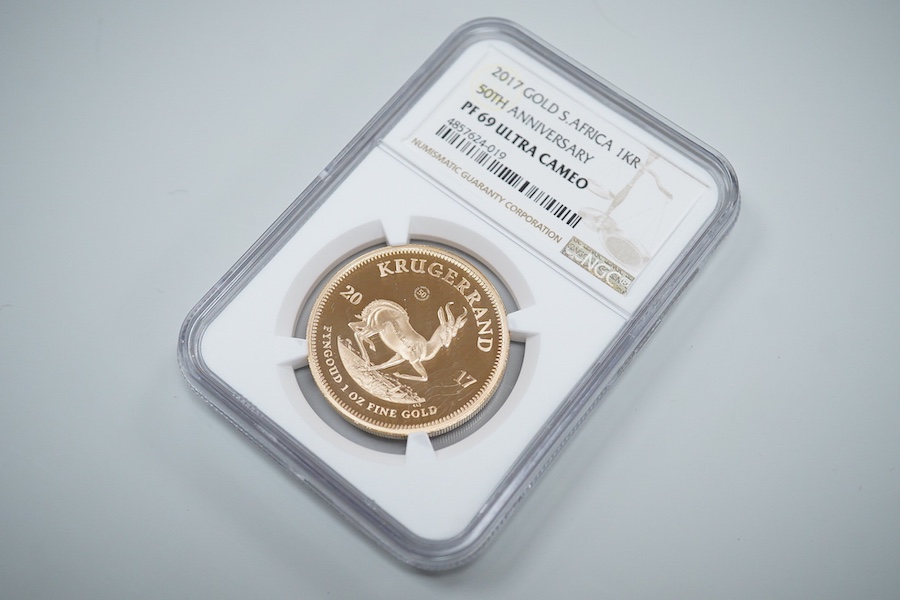 Gold coins, South Africa, 1oz. gold Krugerrand, 2017, NGC encapsulated and graded PF 69 ultra cameo, plastic case scratched